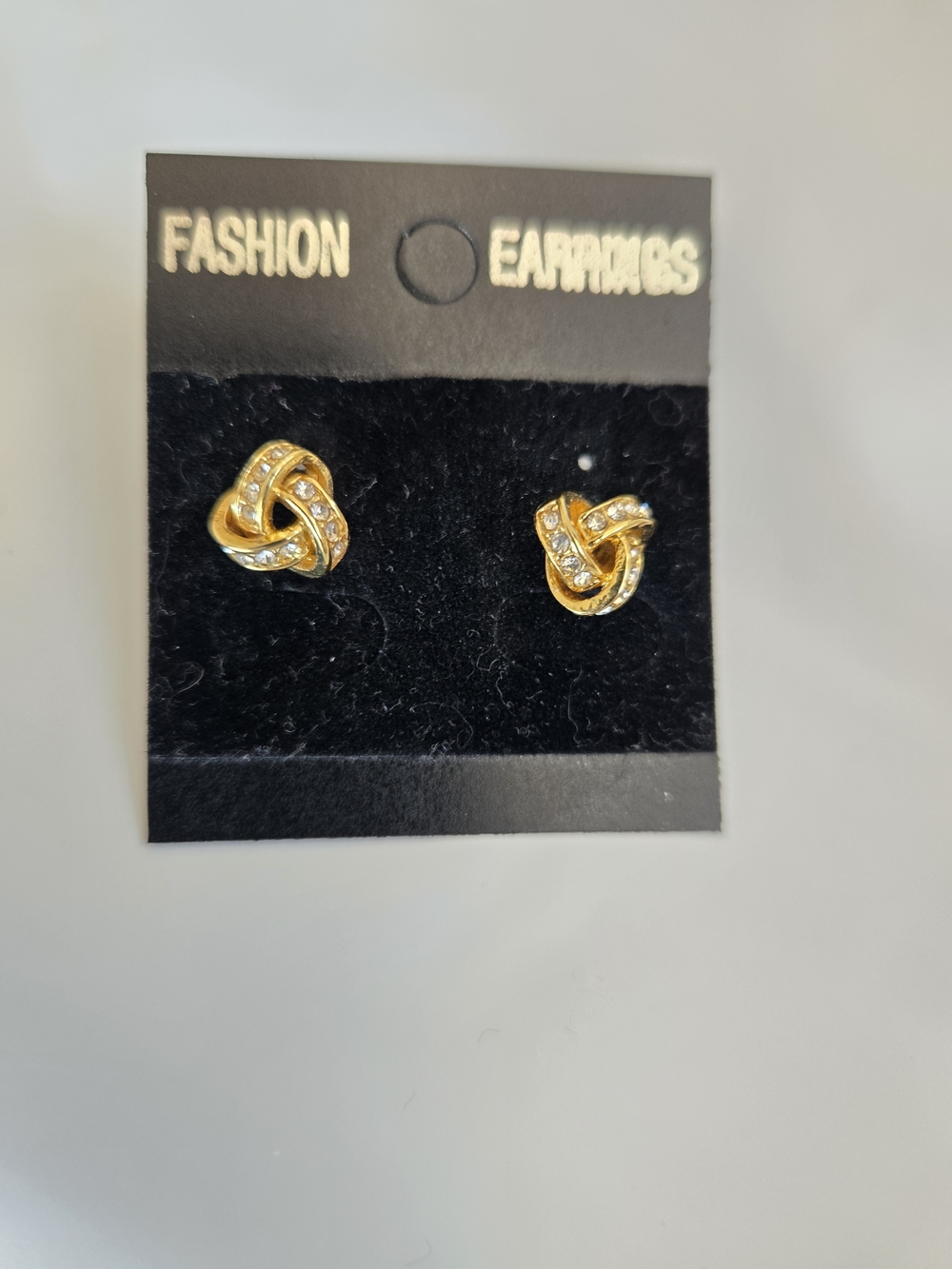 Unk Gold Knot Earrings with Clear Stones